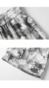 Macro view of retro tie-dye fabric texture and stitching details of men's shorts