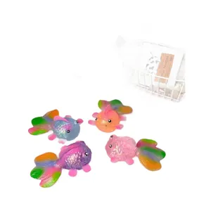 Four colorful glittery maltose goldfish squeeze toys, sensory stress relief fidget fish