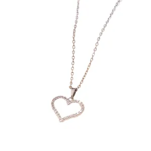 Silver heart pendant necklace with shimmering crystals on a delicate chain
