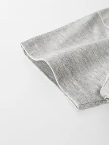 Detailed view of grey short sleeve cotton t-shirt for boys showing fine stitching