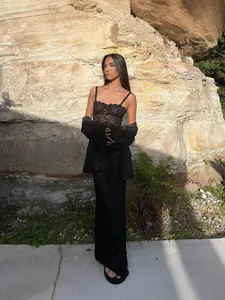 Elegant black lace see-through slim-fit maxi dress with spaghetti straps and blazer
