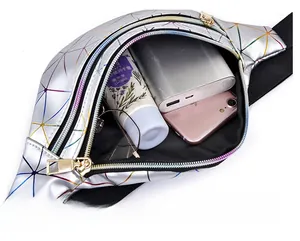 Detailed interior view of a holographic geometric waist bag showing large storage capacity