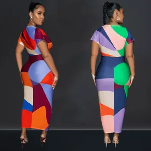 Detail view of a vibrant geometric printed maxi dress featuring a flattering slim fit design.