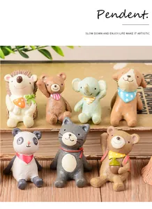 Collection of cute resin animal figurines featuring panda, cat, and hedgehog for decor