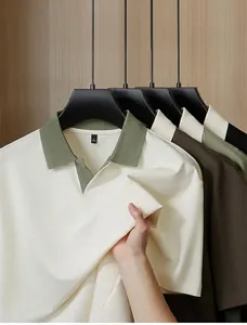 Close-up detail of premium 40s knit fabric on men's contrast collar Polo shirt