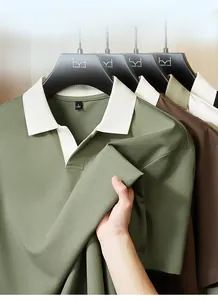 Close-up of premium short-sleeved polo shirts in olive green and brown tones