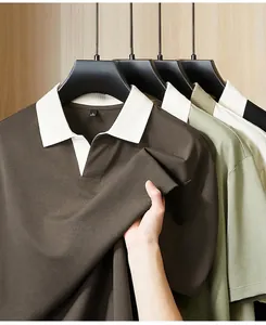 Detail of short-sleeve Polo shirt with contrast collar and smooth fabric texture