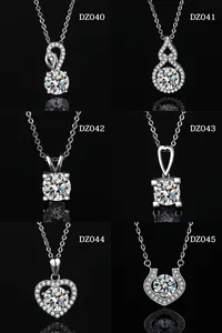 Selection of minimalist moissanite-style necklace pendants in various silver designs