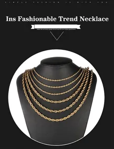 Macro view of gold-plated stainless steel rope chains in different sizes on a black bust
