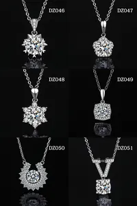 Detailed view showing six unique moissanite necklace pendants with silver plating