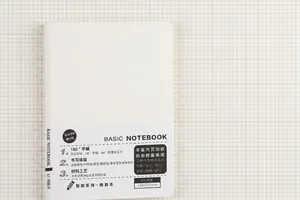 Detailed view of A5 grid notebook with 100g paper and 180-degree flat lay binding