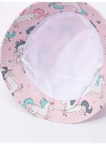 Interior detail of pink baby bucket hat with mesh lining and chin strap.