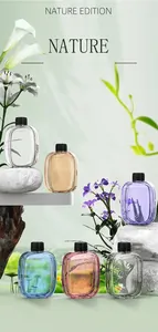 Six colorful essential oil bottles for automatic aroma diffuser in nature setting