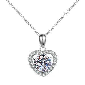 Elegant heart-shaped silver necklace with a large sparkling central moissanite stone