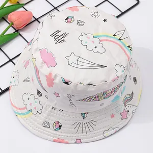 White cartoon printed baby bucket hat with unicorn and rainbow patterns for sun protection