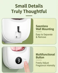 Close-up of wall-mounted automatic fragrance dispenser with digital display and button