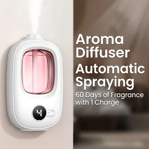 Minimalist white automatic aroma diffuser with pink essential oil tank and digital display.