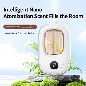 Smart white automatic aromatherapy machine and essential oil diffuser in a nature setting