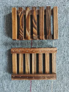 Detailed top and bottom views of a retro carbonized wooden soap dish with slats