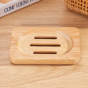 Detailed view of natural bamboo soap dish with three drainage slots for bathroom
