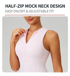 Close-up detail of light pink tennis dress featuring stand collar and half-zipper