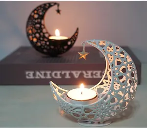 Exquisite decorative hollow metal moon candle holder with star pendant detail