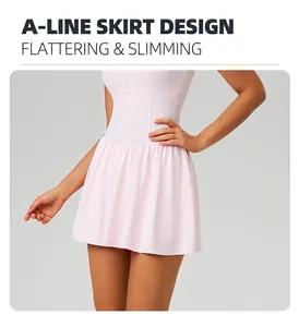 Close-up detail of a pink A-line tennis dress with high-waist athletic design