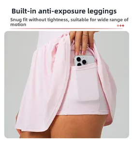 Detailed view of pink tennis dress featuring built-in shorts and a functional phone pocket