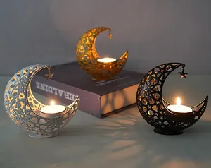 Elegant crescent moon hollow metal candle holders for home decoration and aromatherapy.