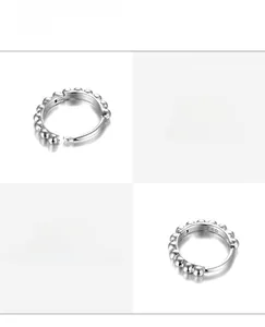 Macro detail view of S925 sterling silver beaded hoop earrings with vintage style finish.