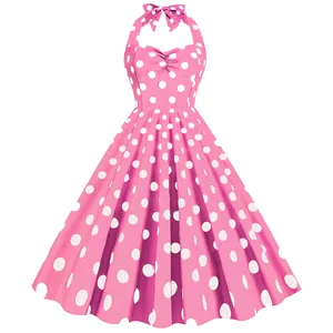 Abito vintage a pois rosa con allacciatura al collo per feste a tema