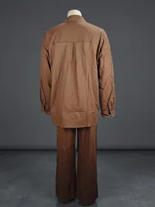 Back view of women's casual brown two-piece set with loose long sleeve shirt and trousers