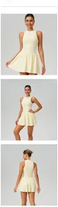 Creamy yellow athletic tennis dress with A-line skirt shown from front side and back views