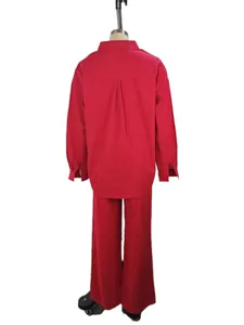 Back view of a vibrant red loose-fit shirt and wide-leg trousers casual set for women