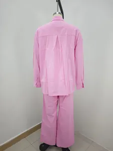 Back view of a pink loose long-sleeve shirt and wide-leg pants two-piece casual set
