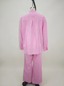 Back view of a pink loose long-sleeve shirt and wide-leg pants two-piece casual set
