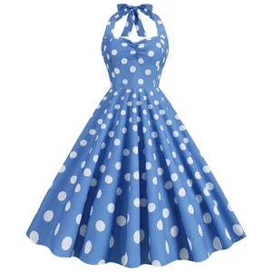 Abito vintage azzurro a pois bianchi, scollo all'americana con fiocco e gonna a A.