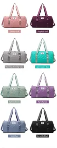 Detailed collection view of large capacity travel duffel bags in eight vibrant colors