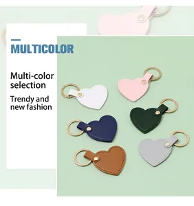 Collection of colorful heart-shaped leather keychains in various soft pastel shades