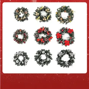 Selection of various Christmas wreaths in gold, red, and silver for door decoration