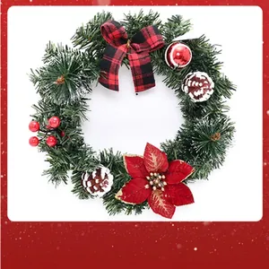 Detailed close-up of a festive artificial Christmas wreath with pine cones and berries