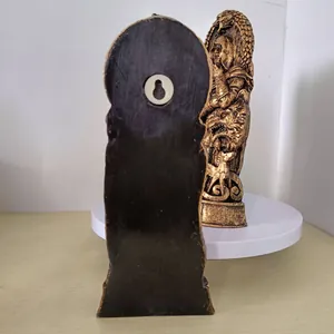 Detailed view of Nordic gods resin statue showing front carving and back wall mount.