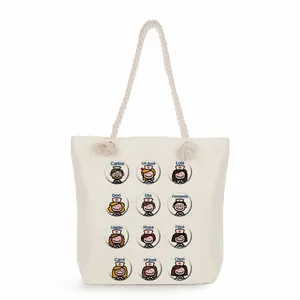 Large canvas tote bag featuring cute cartoon nurse character prints and rope handles