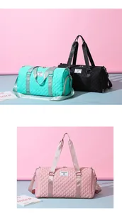 Large capacity quilted travel duffel bag in pink, green, and black for gym and travel