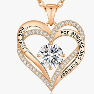 Rose gold double heart necklace with engraved message and central clear birthstone