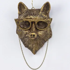 Detailed front view of a retro animal wall hanging with glasses and chain