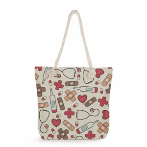 Detail view of large canvas tote bag with medical nurse theme print and rope handles