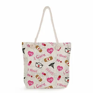 Detailed view of large capacity canvas tote bag with pink nurse theme print