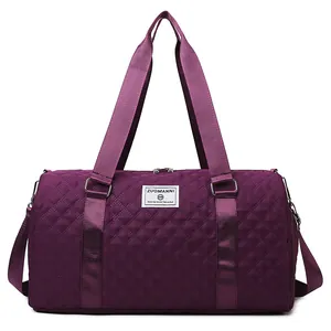 Large capacity purple quilted travel bag with shoulder strap for gym and short trips