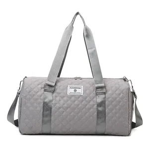 Professional large capacity grey quilted travel duffel bag for gym fitness and trips